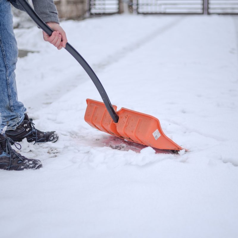 Man removing the snow Man removing the snow